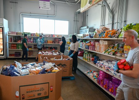 White man shopping for vegetables at a grocery store